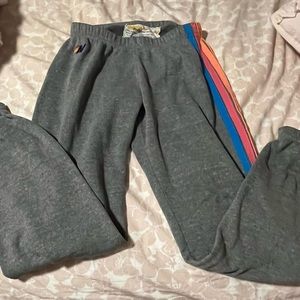 I am selling these adorable grey sweatpants with neon stripes